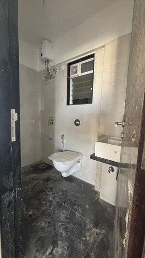 Bathroom in 2 BHK Apartment at Dem Phoenix, Malad East – for Rent