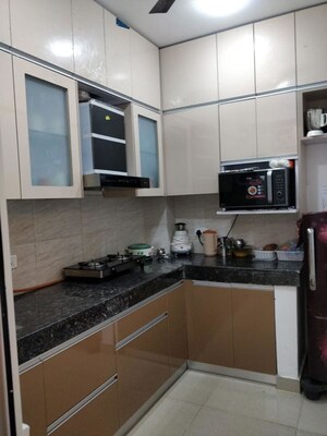 Kitchen in 2 BHK Apartment at Ajnara Le Garden, Sector 16b Greater Noida – for Sale