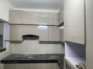 Kitchen in 2 BHK Apartment at Shri Radha Aqua Garden, Sector 16b Greater Noida – for Sale