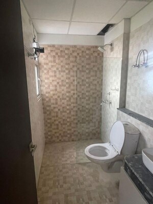 Bathroom in 2 BHK Apartment at Shri Radha Aqua Garden, Sector 16b Greater Noida – for Sale