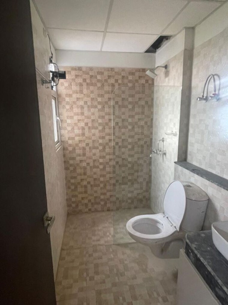 Bathroom, shri-radha-aqua-garden 2 Bedroom 1050 Sq.Ft. Apartment In Sector 16b Greater Noida Greater Noida 10655408