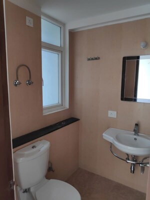 Bathroom in 3 BHK Apartment at Ramprastha City The Edge Towers, Sector 37d – for Rent