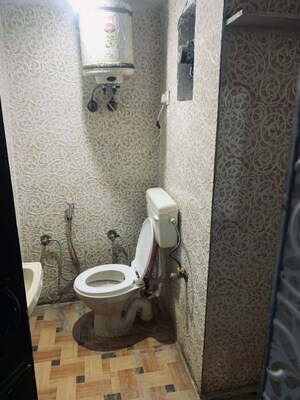 Bathroom in 1.5 BHK Apartment at Tilak Nagar – for Rent