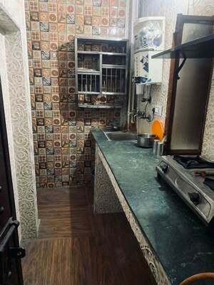 Kitchen in 1.5 BHK Apartment at Tilak Nagar – for Rent