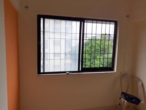 Living Room in 1 RK Apartment at Vanaz Corner, Kothrud – for Rent