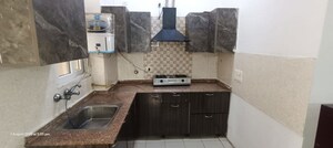 Kitchen in 1 RK Apartment at Amrapali Silicon City, Sector 76 – for Rent