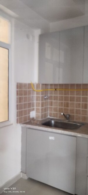 Kitchen in  Apartment at Mahagun My Woods, Sector 16c Greater Noida – for Rent