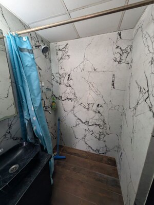 Bathroom in 3.5 BHK Apartment at Mahagun My Woods, Sector 16c Greater Noida – for Rent