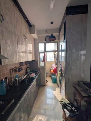 Kitchen in 3.5 BHK Apartment at Mahagun My Woods, Sector 16c Greater Noida – for Rent