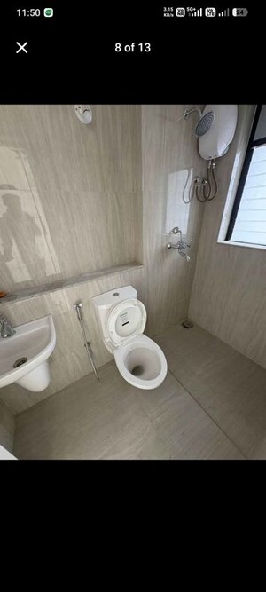 Bathroom in 2 BHK Apartment at Runwal Gardens, Dombivli East – for Rent