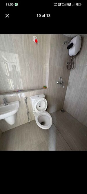Bathroom in 2 BHK Apartment at Runwal Gardens, Dombivli East – for Rent