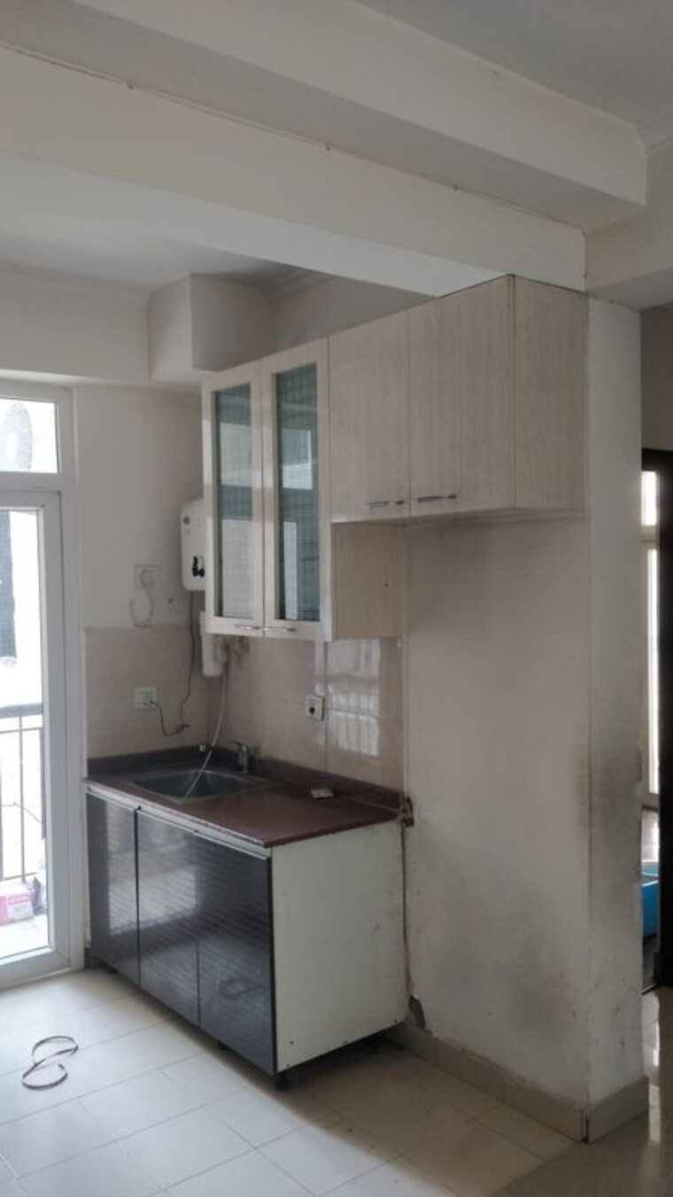 Kitchen, amrapali-zodiac 2 Bedroom 950 Sq.Ft. Apartment In Sector 120 Noida 10655587