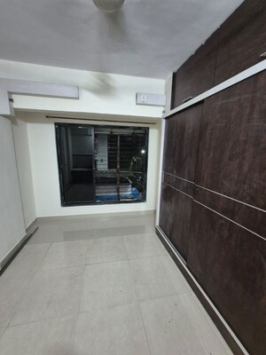 Bedroom in 2 BHK Apartment at Vimla Plaza, Ghansoli – for Rent