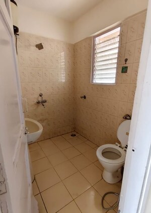 Bathroom in 2 BHK Apartment at Crystal Garden Estate CHS, Manpada – for Rent