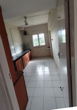 Kitchen in 2 BHK Apartment at Crystal Garden Estate CHS, Manpada – for Rent