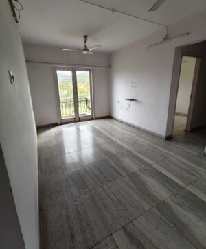 Room in 2 BHK Apartment at Crystal Garden Estate CHS, Manpada – for Rent