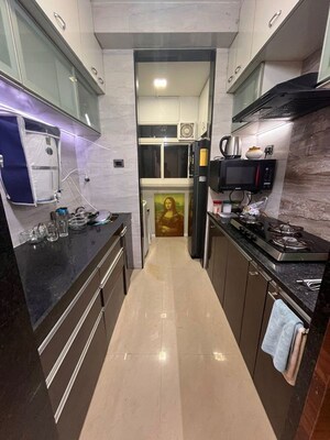 Kitchen in 1.5 BHK Apartment at DB Orchid Ozone, Dahisar East – for Rent
