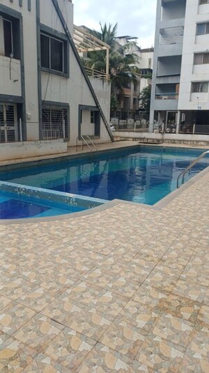Swimming Pool in 2 BHK Apartment at Solitaire Co Op Housing Society Ltd, Dhanori – for Sale