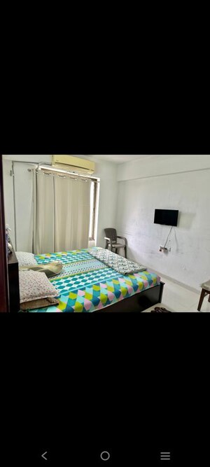 Bedroom in 2 BHK Apartment at Basil Skyline, Tragad – for Rent