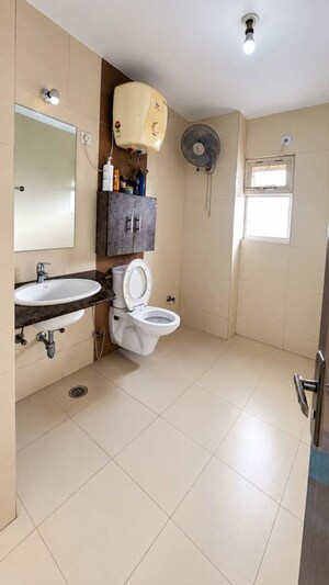 Bathroom in 3 BHK Apartment at IFCI 21st Milestone Residency, Raj Nagar – for Sale