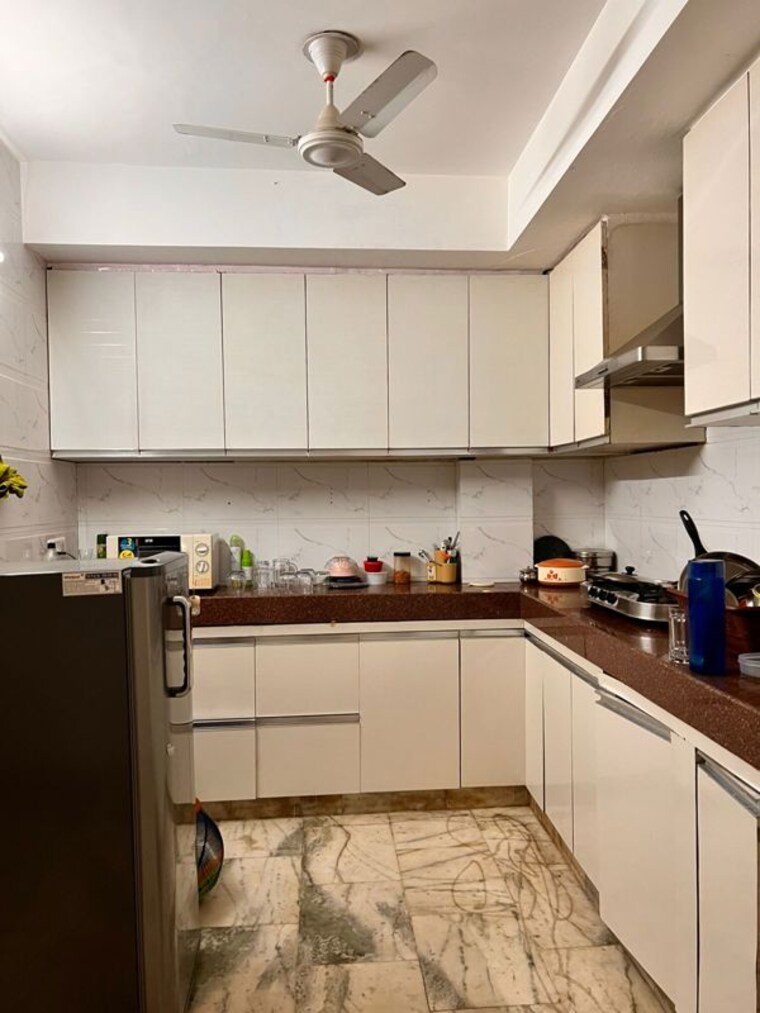 Kitchen, lajpat nagar i 2 Bedroom 900 Sq.Ft. Builder Floor In Lajpat Nagar I Delhi 10655911