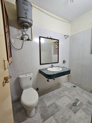 Bathroom in 3 BHK Builder Floor at Ansal Palam Triangle, Palam Vihar Extension – for Rent