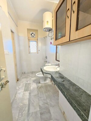 Bathroom in 3 BHK Builder Floor at Ansal Palam Triangle, Palam Vihar Extension – for Rent