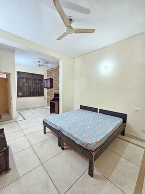 Bedroom in 3 BHK Builder Floor at Ansal Palam Triangle, Palam Vihar Extension – for Rent