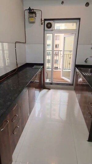 Kitchen in 2 BHK Apartment at Rustomjee Urbania Azziano, Thane West – for Sale