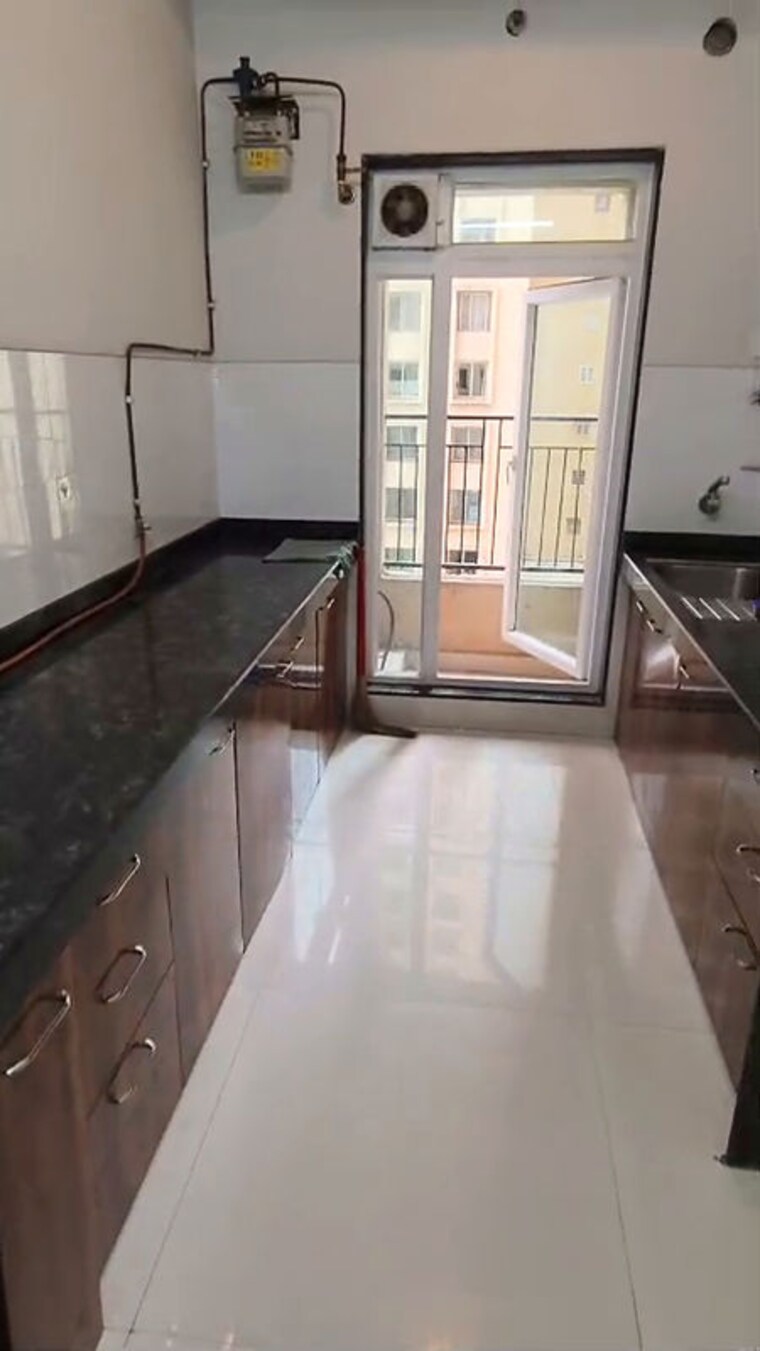 Kitchen, rustomjee-urbania-azziano 2 Bedroom 853 Sq.Ft. Apartment In Thane West Thane 10656045