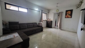 Living Room in 1 BHK Apartment at Lodha Lakeshore Greens, Dombivli East – for Rent