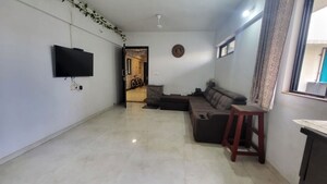 Living Room in 1 BHK Apartment at Lodha Lakeshore Greens, Dombivli East – for Rent