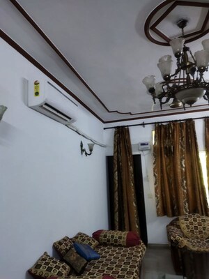 Living Room in 2 BHK Apartment at Windsor and Nova Society, Ahinsa Khand 2 – for Rent