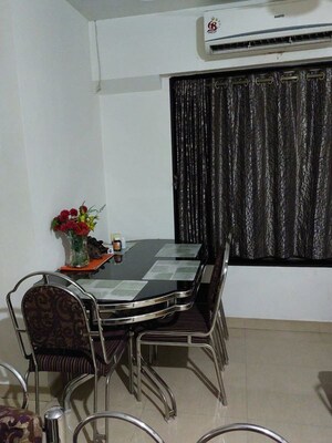 Dining Room in 2 BHK Apartment at Shah Arcade II, Malad East – for Rent