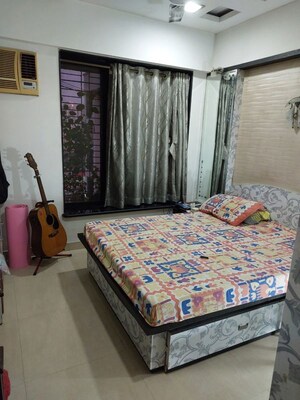 Bedroom in 2 BHK Apartment at Shah Arcade II, Malad East – for Rent