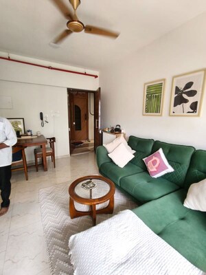 Living Room in 1 BHK Apartment at JP Eminence, Andheri West – for Rent