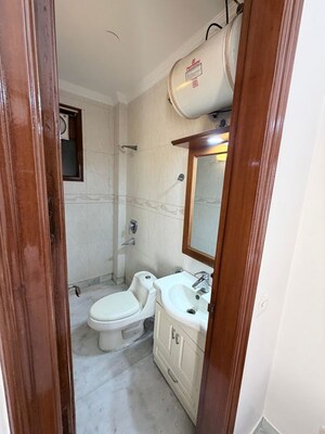 Bathroom in 3 BHK Builder Floor at Defence Colony – for Rent