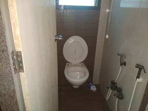 Bathroom in 2 BHK Apartment at Ashish CHS Andheri, Andheri West – for Sale