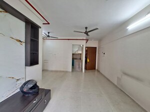 Living Room in 2 BHK Apartment at Dosti West County Phase 4 Dosti Pine, Balkum Pada – for Rent