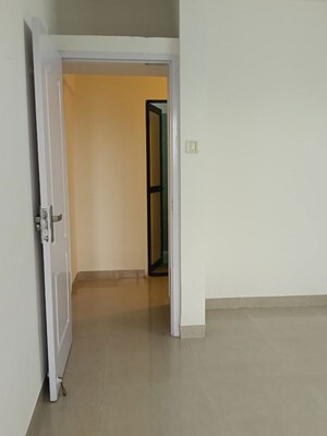 Room in 2 BHK Apartment at Swapnalok Towers, Malad East – for Rent
