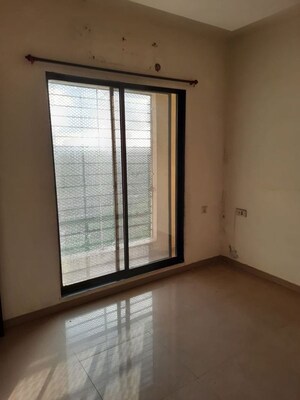 Bedroom in 2 BHK Apartment at Sai Proviso Dhanishta, Kopar Khairane – for Rent