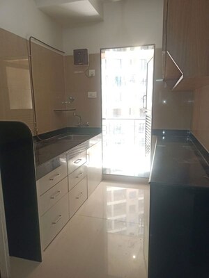 Kitchen in 2 BHK Apartment at K Raheja Raheja Residency, Malad East – for Rent