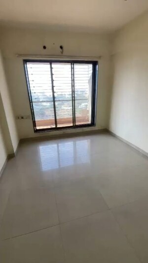 Bedroom in 2 BHK Apartment at Trishul Patel Heights, Ghansoli – for Rent