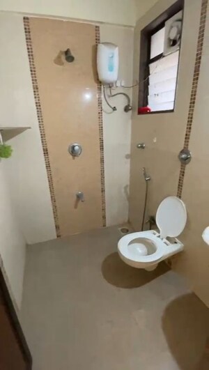 Bathroom in 2 BHK Apartment at Trishul Patel Heights, Ghansoli – for Rent