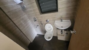 Bathroom in 1 BHK Apartment at Lodha Palava Crown, Dombivli East – for Rent
