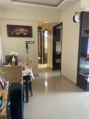 Living Room in 2 BHK Apartment at Nisarg Hyde Park, Kharghar – for Rent