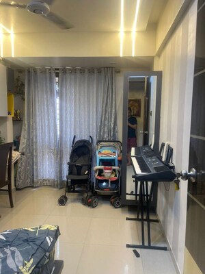 Bedroom in 2 BHK Apartment at Nisarg Hyde Park, Kharghar – for Rent