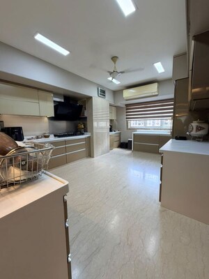 Kitchen in 5 BHK Apartment at Lokhandwala Complex – for Sale