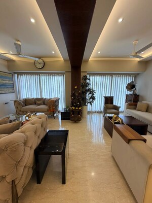 Living Room in 5 BHK Apartment at Lokhandwala Complex – for Sale