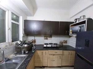 Kitchen in 2 BHK Apartment at Gaur City 2 - 14th Avenue, Sector 16c Greater Noida – for Rent